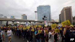 Warga Korea Selatan melakukan rally 100 hair setelah kapal feri Sewol tenggelam di Seoul, Korea Selatan, 24 Juli 2014. 