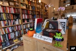 A display shows signed books in the JF Books bookstore in Washington, Oct. 3, 2024.