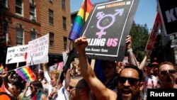 FILE - Members of Gays Against Guns march in the annual NYC Pride parade in New York City, New York, June 26, 2016. 