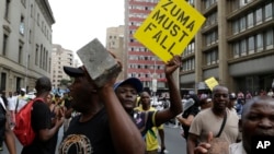 Members of the African National Congress (ANC) protest outside the party's headquarters in downtown Johannesburg, Feb. 5, 2018 calling for President Jacob Zuma to step down. 