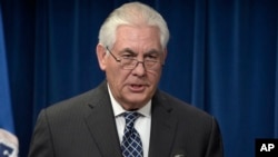 Secretary of State Rex Tillerson makes a statement on issues related to visas and travel, March 6, 2017, at the U.S. Customs and Border Protection office in Washington. 