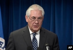 FILE - Secretary of State Rex Tillerson makes a statement on issues related to visas and travel, March 6, 2017, at the U.S. Customs and Border Protection office in Washington.
