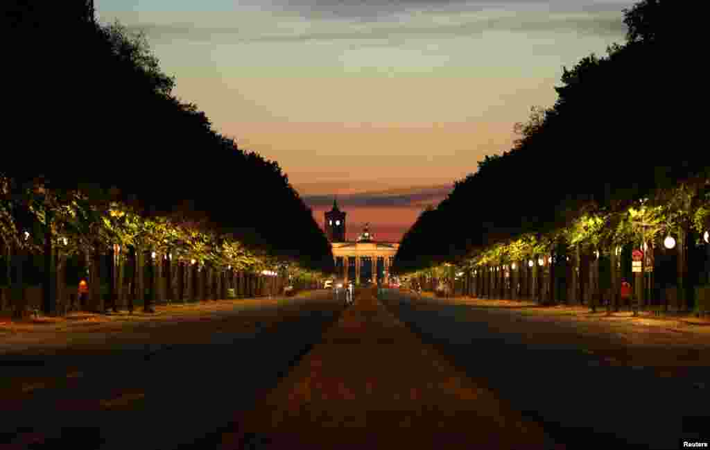 A view of empty roads leading to Brandenburg Gate as climate activists from the group Extinction Rebellion block roads around the Victory Column near the gate in a first wave of "civil disobedience" in Berlin, Germany.