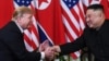 US President Donald Trump (L) shakes hands with North Korea's leader Kim Jong Un following a meeting at the Sofitel Legend Metropole hotel in Hanoi on February 27, 2019. 