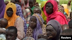 Wasu matan da 'yan Boko Haram suka kashe mazajensu
