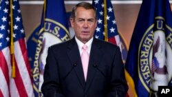 House Speaker John Boehner speaks about the trade bill during a news conference on Capitol Hill in Washington, June 11, 2015.