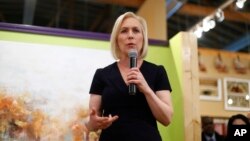 FILE - Democratic presidential candidate Sen. Kirsten Gillibrand speaks at a campaign meet-and-greet in Clawson, Michigan, March 18, 2019. 