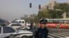 Polisi China Tangkap Tersangka Pengebom Kantor Partai Komunis