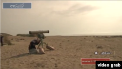 Iranian military personnel prepare to fire a laser-guided anti-ship missile (AShM) called Dehlaviyeh as part of a major naval exercise. Iranian state media say the test happened Feb. 27, 2017. (Screen grab from IRIB News Agency video)