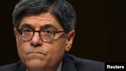 FILE - US Treasury Secretary Jack Lew testifies before the Senate Finance Committee on the US government debt limit in Washington.