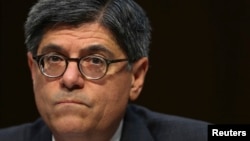 FILE - U.S. Treasury Secretary Jack Lew testifies before the Senate Finance Committee on the U.S. government debt limit in Washington, Oct. 10, 2013.