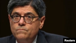 FILE - U.S. Treasury Secretary Jack Lew warns that congressional squabbling over raising the government's debt limit could harm the economy overall. He's shown in 2013. 