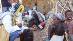 VOA journalist from Sudan reporting
from refugee camp on Ethiopian border.