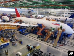 Workers assemble Boeing 787 Dreamliners at the company's massive assembly plant in North Charleston, S.C.