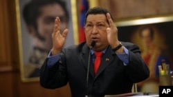 Venezuela's President Hugo Chavez talks during a press conference at Miraflores palace in Caracas, October 9, 2012.