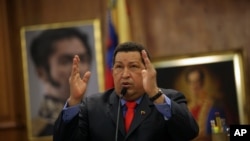 Venezuela's President Hugo Chavez talks during a press conference at the Miraflores palace in Caracas, Venezuela, October 9, 2012. 