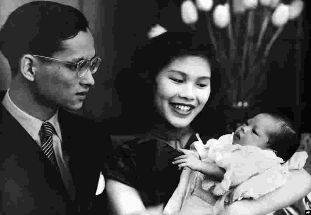 Princess Ubol Ratana (diamond lotus) with her parents, King Bhumibol Adulyadej, 24, and Queen Sirikit, 19, May 2, 1951. The Princess was born at Lausanne, Switzerland on April 6, eleven months after the marriage and coronation of her parents in Bangkok.