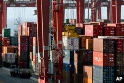 Containers are stacked in the port of El Callao, Peru, Nov. 17, 2016. Asia-Pacific Economic Cooperation leaders will meet in Lima Nov. 19-20 to discuss the future of international trade policies, growth and improvement of life conditions for more than a third of the world's population.