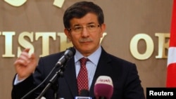 FILE - Turkey's Foreign Minister Ahmet Davutoglu 