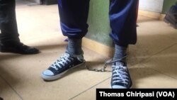 FILE: Job Sikhala in leg irons