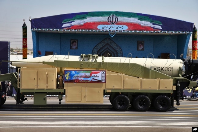 Iran's Khoramshahr missile is displayed by the Revolutionary Guard during a military parade marking the 37th anniversary of Iraq's 1980 invasion of Iran, outside Tehran, Sept. 22, 2017.
