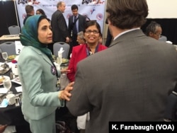 Sarwat Husain (left, in a green jacket) at the AMDC Luncheon at the Pennsylvania Convention Center during the Democratic National Convention.