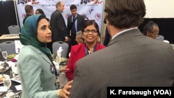 Sarwat Husain (left, in green jacket) at the AMDC Luncheon at the Pennsylvania Convention Center during the Democratic National Convention.