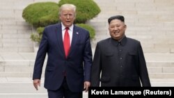 Donald Trump meets with North Korean leader Kim Jong Un at the demilitarized zone 