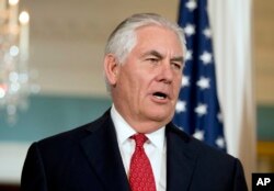 FILE - U.S. Secretary of State Rex Tillerson answers a reporter's question at the State Department, in Washington, Oct. 13, 2017.