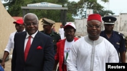 FILE - Sierra Leonean Vice President Samuel Sam-Sumana, shown in Freetown in October 2012, says he's feeling well but "decided to be put under quarantine because I do not want to take chances."