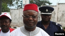 FILE - Sierra Leonean Vice President Samuel Sam-Sumana, shown in Freetown in October 2012, says he's feeling well but "decided to be put under quarantine because I do not want to take chances."