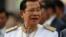 Cambodia's Prime Minister Hun Sen waits to attend the Independence Day celebrations in Phnom Penh, Cambodia, Thursday, Nov. 9, 2017. Some hundreds of civil servants and students gathered to mark the country's 64th Independence Day. The country gained independence from France on Nov. 9, 1953. (AP Photo/Heng Sinith)