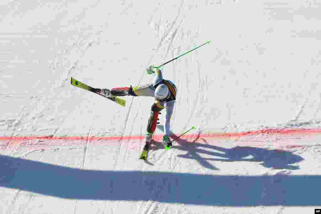 Norway&#39;s Sebastian Foss Solevaag crosses the finish line to win the men&#39;s slalom, at the Alpine Ski World Championships, in Cortina d&#39;Ampezzo, Italy.