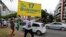 A supporter of presidential candidate Jair Bolsonaro is seen in front of Bolsonaro's condominium at Barra da Tijuca neighborhood in Rio de Janeiro, Brazil,, Oct. 4, 2018.