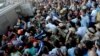 Egyptian Army soldiers respond to clashes between supporters and opponents of ousted President Mohammed Morsi in Alexandria, Egypt, Friday, Sept. 13, 2013.