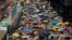 Thousands of protesters raise umbrellas during a rally to support young activists Joshua Wong, Nathan Law and Alex Chow in downtown Hong Kong, Aug. 20, 2017.