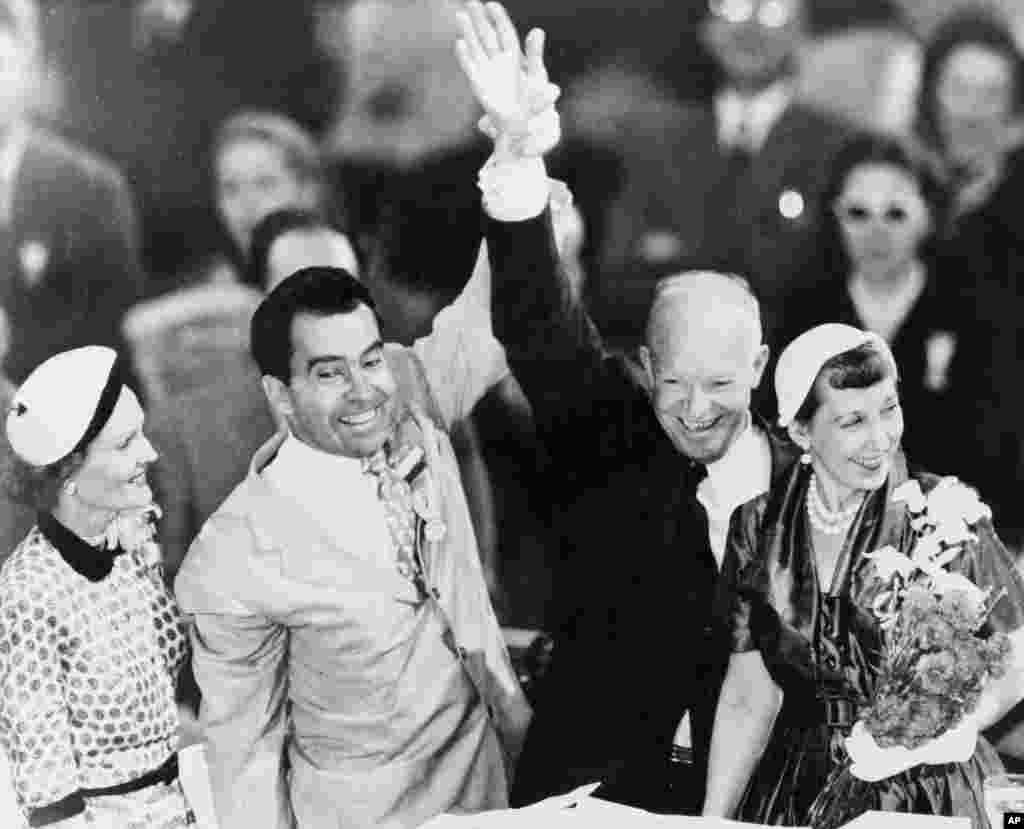 FILE - Gen. Dwight D. Eisenhower, second from right, and Sen. Richard Nixon, second from left, celebrate their nomination for president and vice president of the United States, respectively, with their wives at the 1952 Republican Convention in Chicago, I