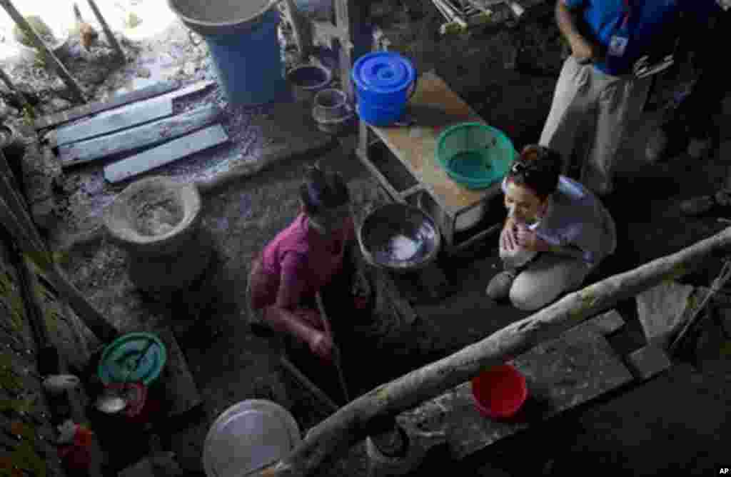Denmark’s crown Princess Mary, right, watches a Buddhist woman making rice noodles during a visit to a Buddhist resettlement village in Sittwe, Rakhine State, Myanmar, Sunday, Jan 12’ 2014. Crown Princess Mary, accompanied by Denmark’s minister for develo