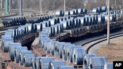 Steel coils sit on wagons when leaving the thyssenkrupp steel factory in Duisburg, Germany, March 2, 2018. German officials and industry groups warned that U.S. President Donald Trump risked sparking a trade war with his closest allies when he backed tariffs on aluminum and steel.