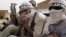 Ansar Dine militiamen traveling in Kidal, northeastern Mali, June 16, 2012.