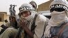 Ansar Dine militiamen traveling in Kidal, northeastern Mali, June 16, 2012.