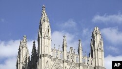 The top of the pinnacle of the National Cathedral Washington is damaged after an earthquake struck the east coast of the United States August 23, 2011