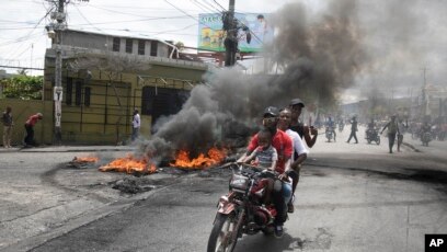 20 Dead, Thousands Flee Homes as Gangs Battle in Haiti