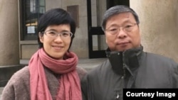 Lu Guang is shown with his wife, Xu Xiaoli, in an undated photo. 