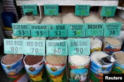 FILE - Different varieties of rice are seen for sale at a food market in Paranaque, Metro Manila, Philippines, Aug. 31, 2018.