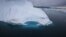 FILE - An iceberg is seen melting off the coast of Ammasalik, Greenland, July 19, 2007.