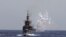 2019年5月22日台灣海空聯合操演，海軍艦船模擬導彈來襲，發射干擾彈，產生大面積干擾雲。