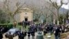 FILE - A ceremony to remember the victims of the Nazi massacre during the World War II is held at the church of Sant' Anna di Stazzema in Sant'Anna di Stazzema, March 24, 2013.