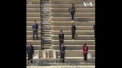 2020东京奥运会圣火在雅典传递给东京奥组委