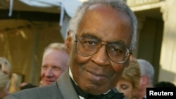 FILE - Actor Robert Guillaume who starred on the television series "Benson," "Soap," and Sports Night" poses as he arrives for the ABC television networks 50th anniversary in Hollywood, California, March 16, 2003.